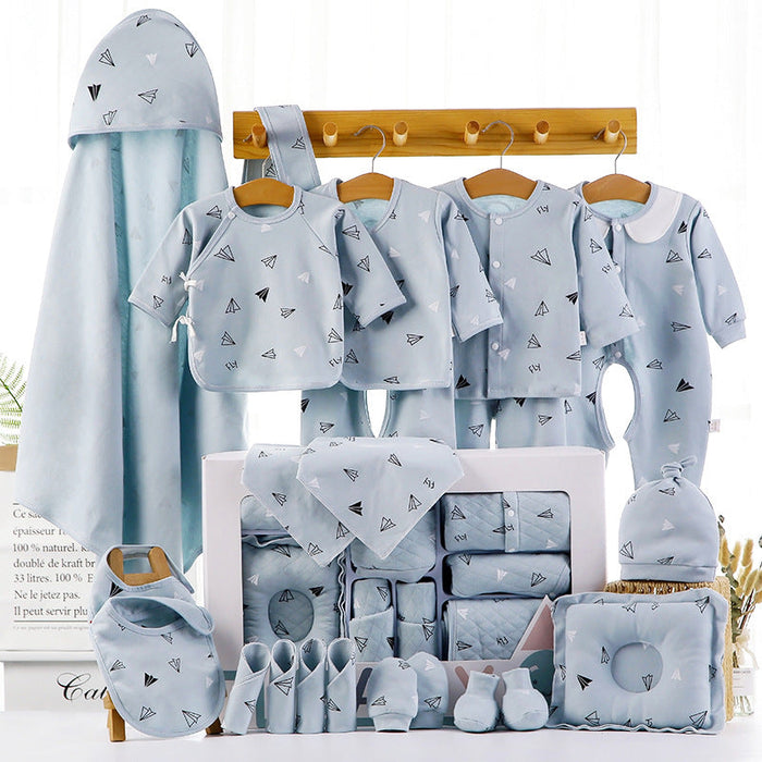 Blue cotton newborn clothing set with hooded blanket, bibs, onesies, socks, and box