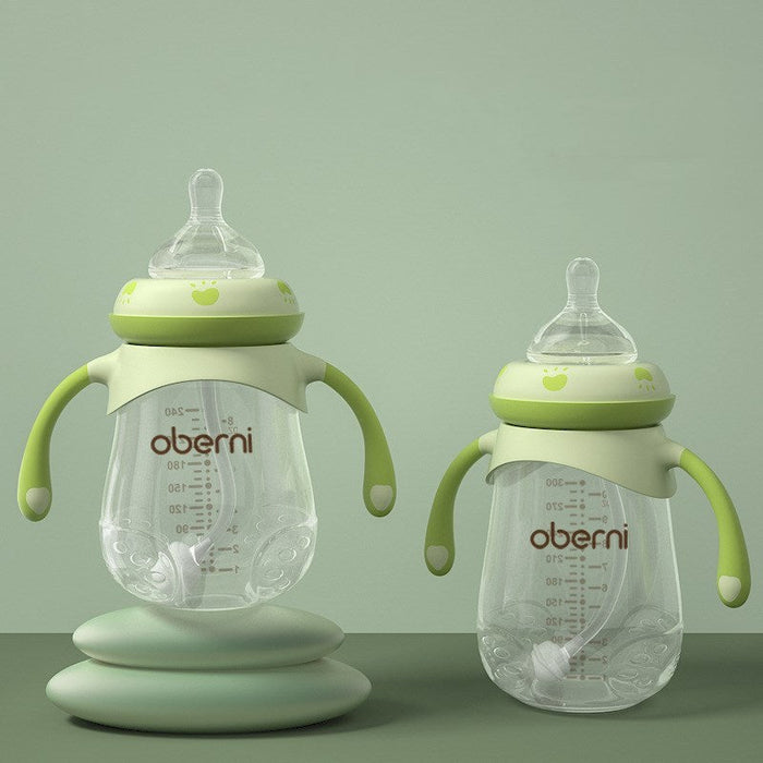 Green wide-neck baby milk anti-colic bottle with silicone anti-fall handles and graduations