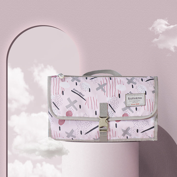 Portable baby changing pad storage bag with flap, pink and gray printed pattern