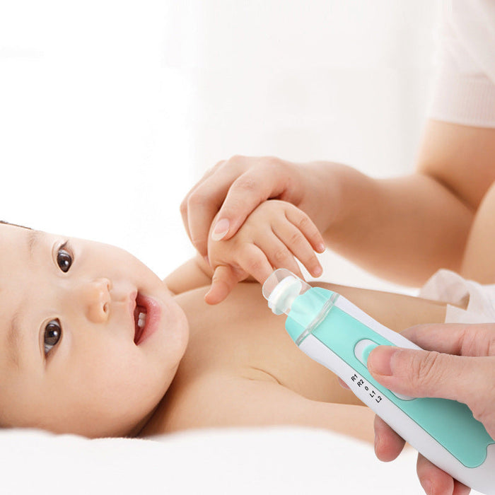 Electric newborn nail trimmer with light, being used on a baby’s fingertip, teal and white.