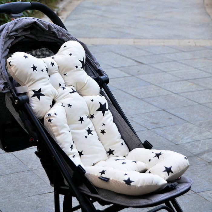 Padded stroller seat pad with white base and black star pattern