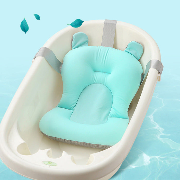 Baby bath seat cushion in aqua with front cutout and attached side straps