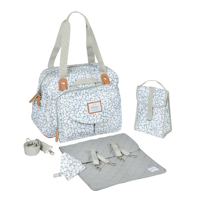 Grey floral changing bag with handles, front pocket, and tan leather-look trim.