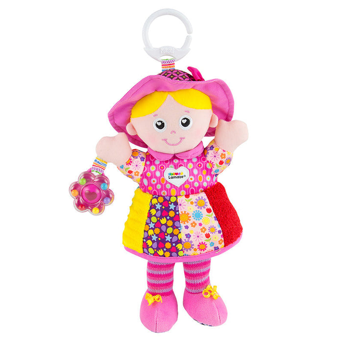 Stuffed doll with pink hair, colorful patterned dress, clip-on loop, flower rattle