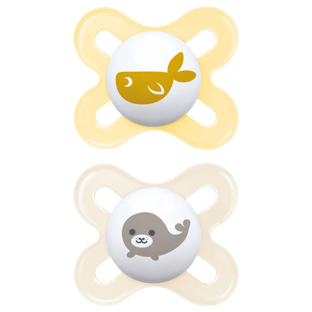 Two MAM Start soothers with pale shields and whale and bear designs