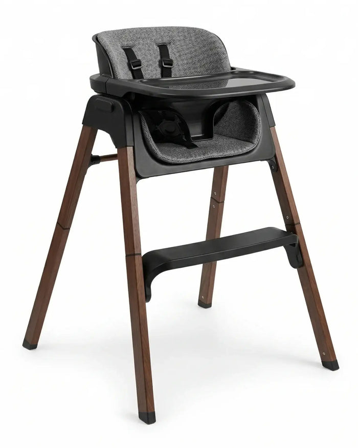 Black high chair with gray padded seat, feeding tray, safety straps