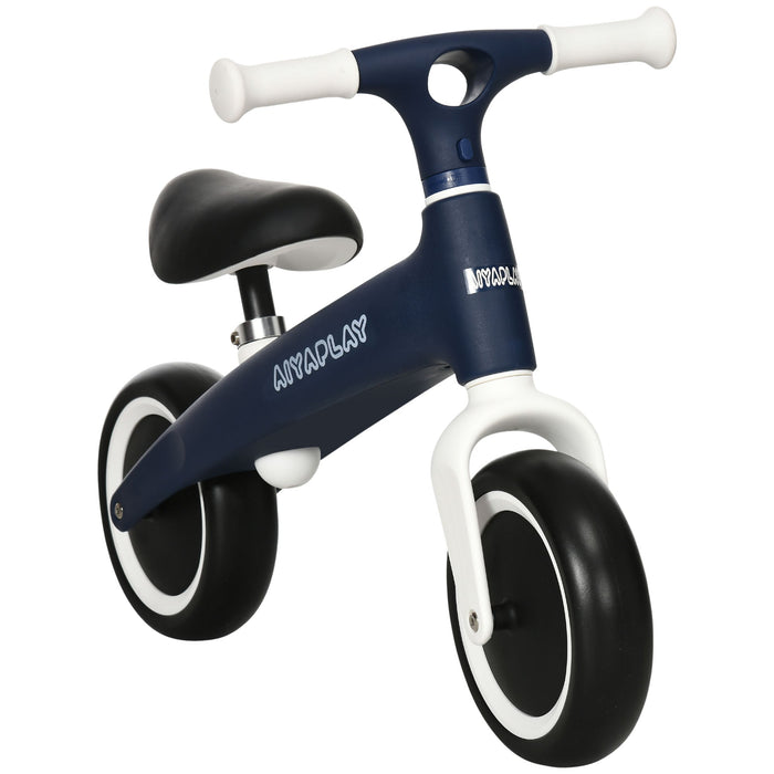 Blue baby balance bike with white handlebars and black seat