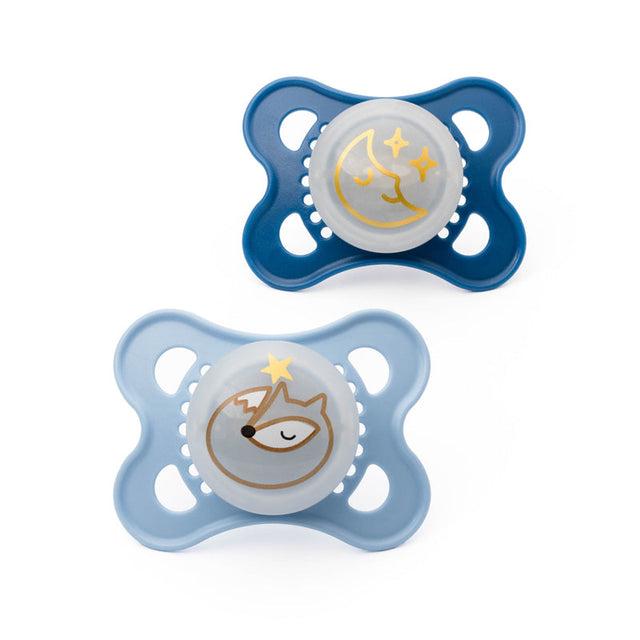 Two blue MAM night soothers with crescent moon and sleeping animal designs
