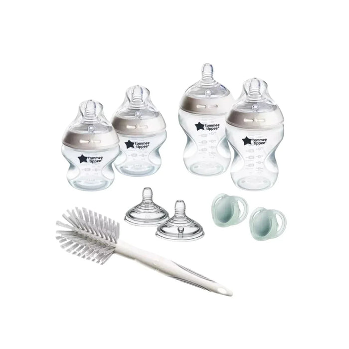 Newborn bottle starter kit: clear feeding bottles, soft teats, brush, and spares