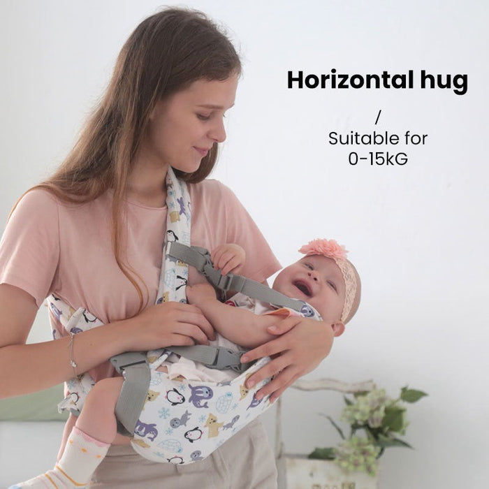 Baby front carrier with waist straps, holding a baby close