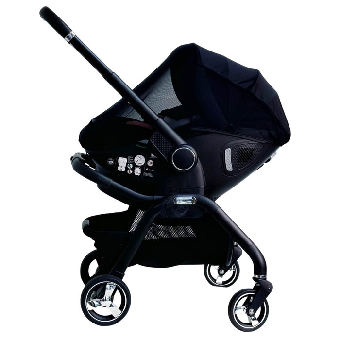 Black mesh mosquito net for car seat stroller, draped over the canopy