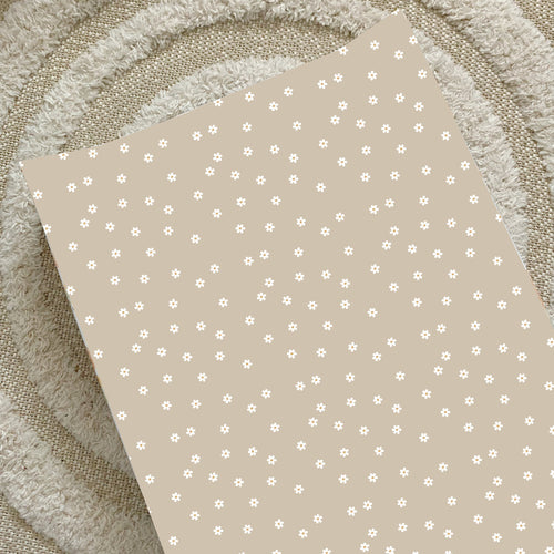 Anti-roll wedge changing mat with neutral daisy star pattern