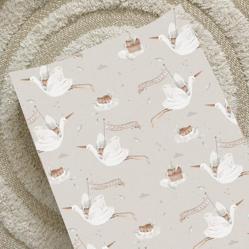 White anti-roll baby changing mat with stork and welcome baby print