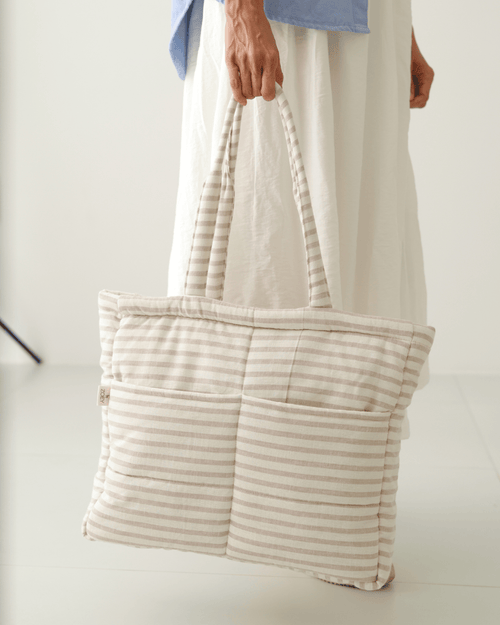 Cream tan-striped tote nappy bag with front pocket panel and rope handles, open top